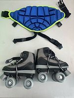Overall view of butt pad and both roller skates