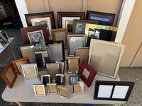 overview of all frames on table showing variety of sizes and finishes