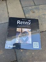 Front of sealed Renny Smart Home Phone box