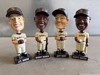 All four San Francisco Giants bobbleheads front view