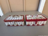Both wicker sewing boxes closed showing exterior weave, handles, closures