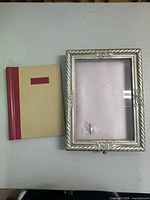 Shadow box frame and photo album front view
