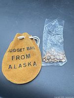 pouch and plastic bag of nuggets overview