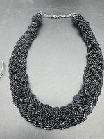 Full view of braided black seed bead collar necklace
