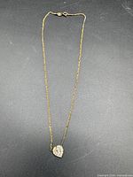 Full view of gold plated sterling silver necklace with heart pendant