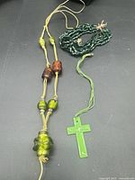 Overview of three green tone necklaces
