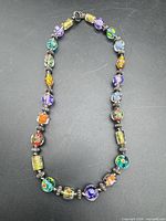 Full view of 20-inch millefiori glass bead necklace with lobster clasp