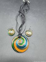 Necklace with pendant and earrings full view