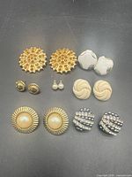 Full layout of seven earring pairs