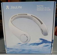 Front of retail box showing Jisulife neck fan image and branding