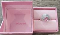 Ring in open pink Swarovski box