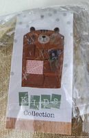 Retail tag showing organizer design and Kids Collection branding