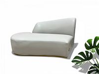 Front view of beige modular sectional seat, angled backrest