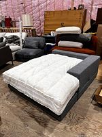 Front angled view of upholstered chaise with white cushion insert