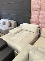 Overall view of cream microfiber chaise lounge with cushions