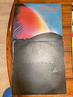 Front sleeves of both LPs visible