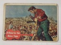 Front of trading card showing Elvis on stage