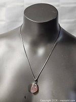 Full view of necklace on display bust