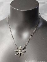 Necklace displayed on bust showing overall appearance