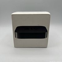 Front of box with image of Apple TV