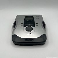 Top view showing Pine D'music SM-200C branding, LCD screen, control buttons