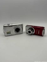 Front view of Nikon Coolpix S3300 and Canon PowerShot SD30