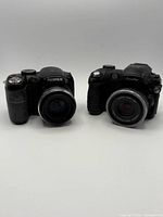 Front view of both Fujifilm bridge cameras