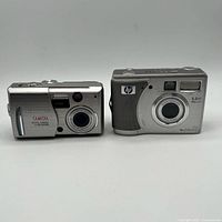 Front view of both cameras highlighting lenses and branding