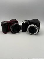 Front view of both cameras showing lenses and branding