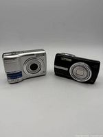 Front view of both cameras showing lenses and branding