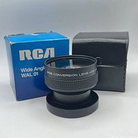 lens, retail box, leather case grouped