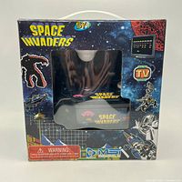 Front of boxed Space Invaders joystick console