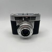 Front view showing Contessa lens, body finish and meter window