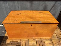 Closed chest front view showing finish and keyhole