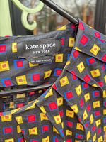 Kate Spade neckline showing brand label and fabric pattern