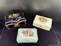 Front view showing three trinket boxes closed