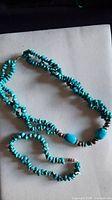 Full view of turquoise chip necklace and bracelet