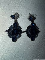 Front view of both earrings showing crystal arrangement