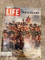 Front cover showing title, date and Waterloo artwork