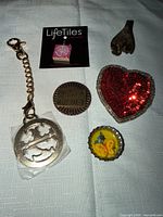 All six items laid out on cloth background