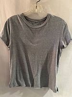 Front view of gray T-shirt on hanger