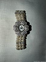 Front view of Nolan Miller pearl stretch watch bracelet