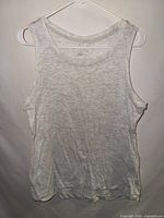 front of gray Danskin tank on hanger