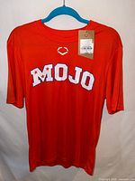 Front view of orange EvoShield Mojo shirt showing full design