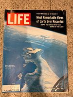 Front cover with earth photo and masthead