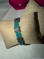 bracelet displayed on cushion showing bead strands and marcasite spacer detail