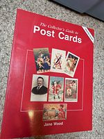 Front cover showing title, author and postcard images