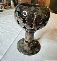 Side view showing chalice profile, stem and base