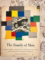 Front cover showing title, design, author credits and overall wear