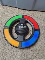 Front view showing colored segments and logo